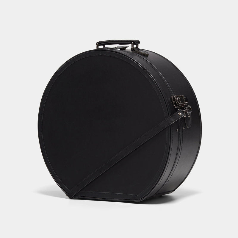 Angled product view of the deluxe hatbox Industrialist fibreboard suitcase in  black