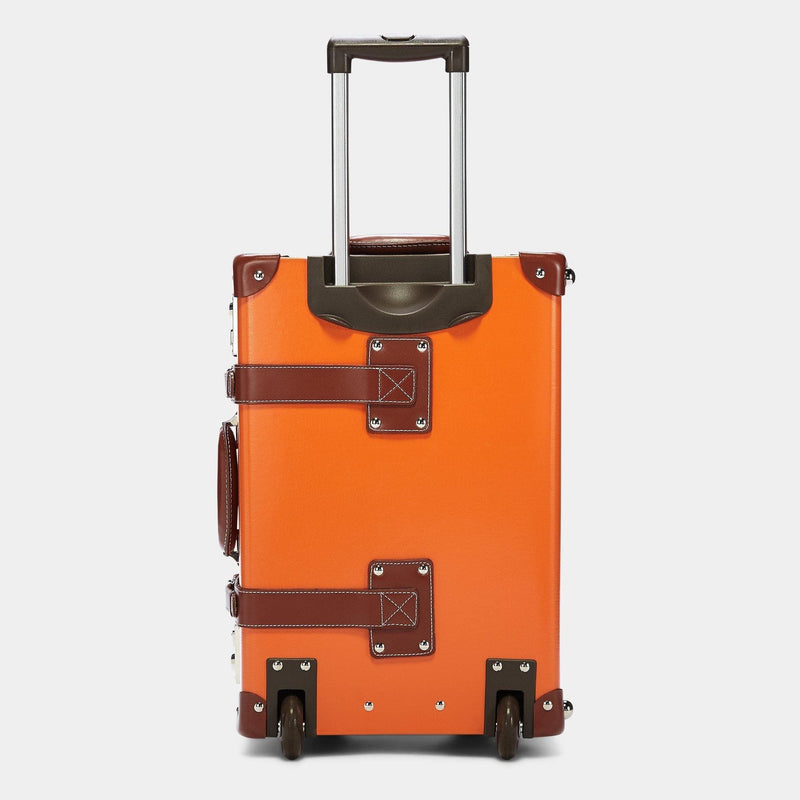 Back product view of the carry-on Anthropologist leather suitcase in orange with raised handle