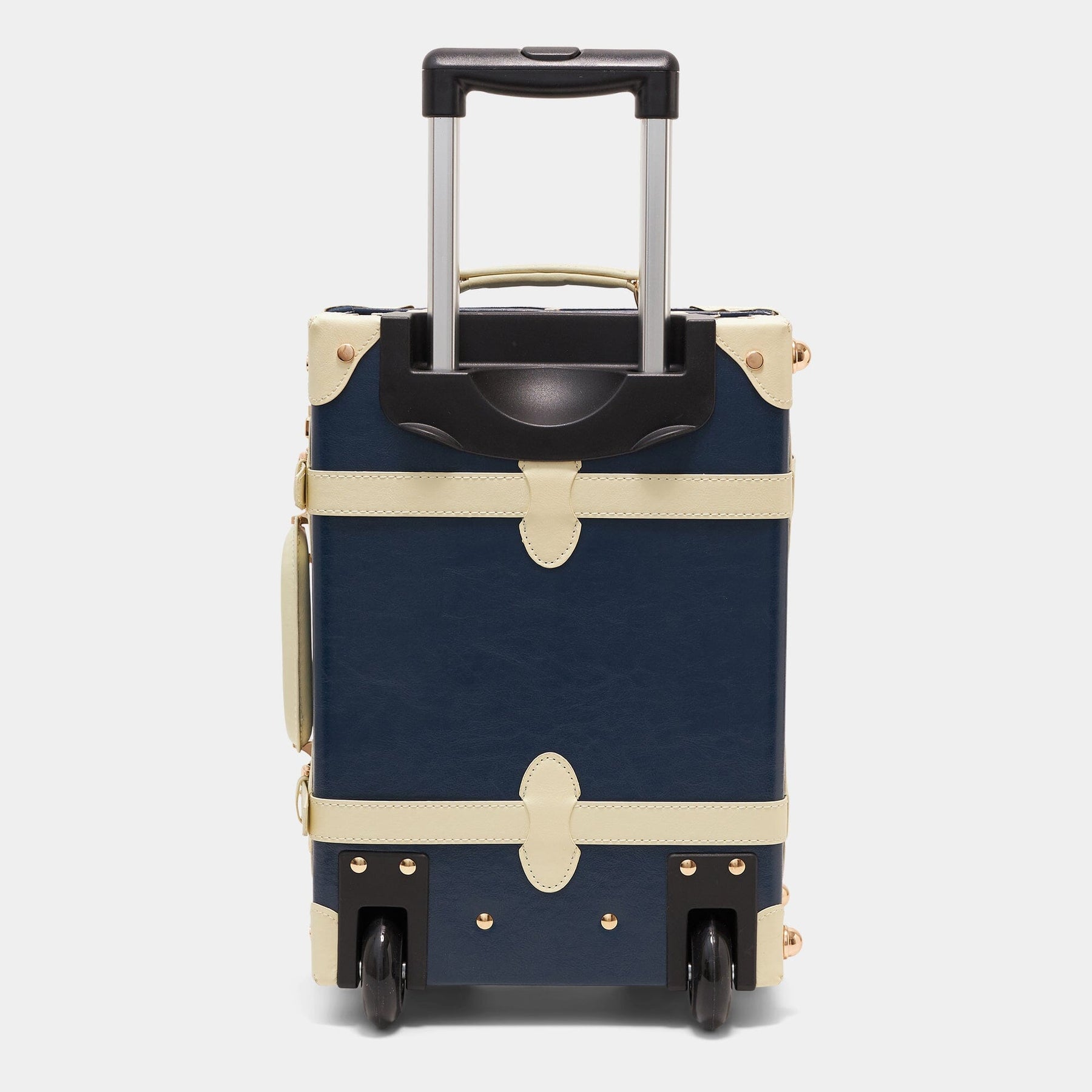 Back product view of the kids carry-on Entrepreneur vegan leather suitcase in navy with raised handle