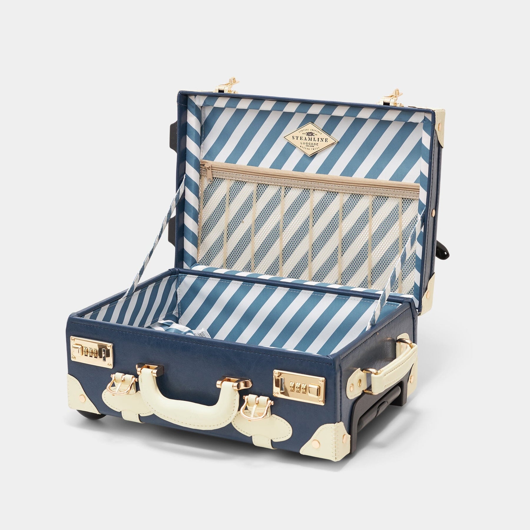 Open product view of the kids carry-on Entrepreneur vegan leather suitcase in navy with blue-white stripe print lining