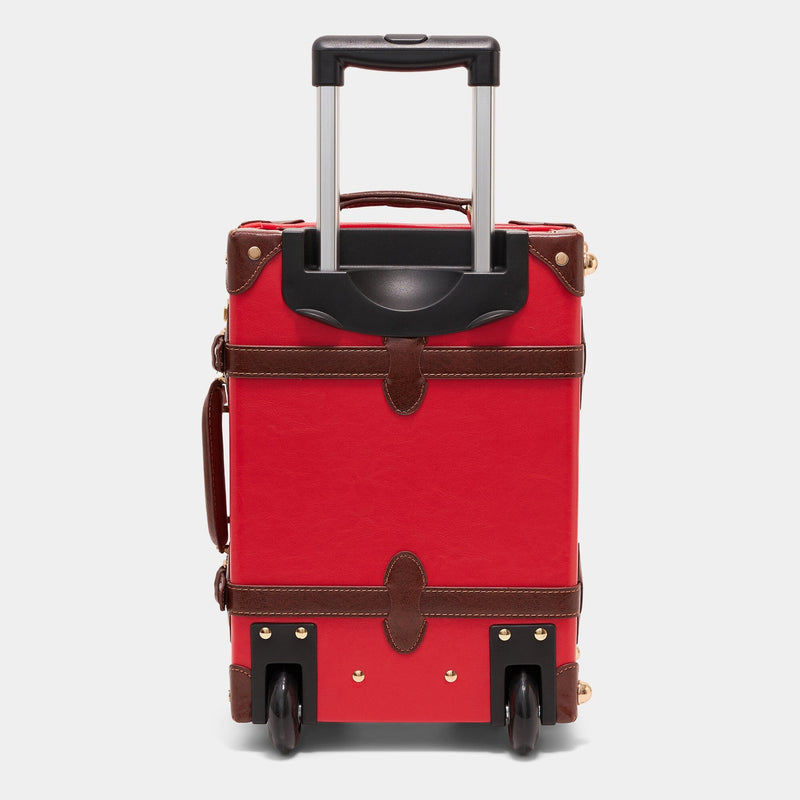 Back product view of the kids carry-on Entrepreneur vegan leather suitcase in red with raised handle