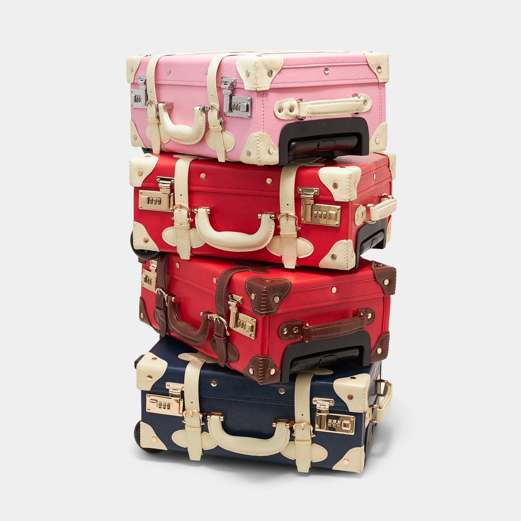 Vintage style kids carry-on Entrepreneur vegan leather suitcases in four colour ways