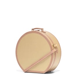 Angled product view of the deluxe hatbox Alchemist vegan leather suitcase in gold