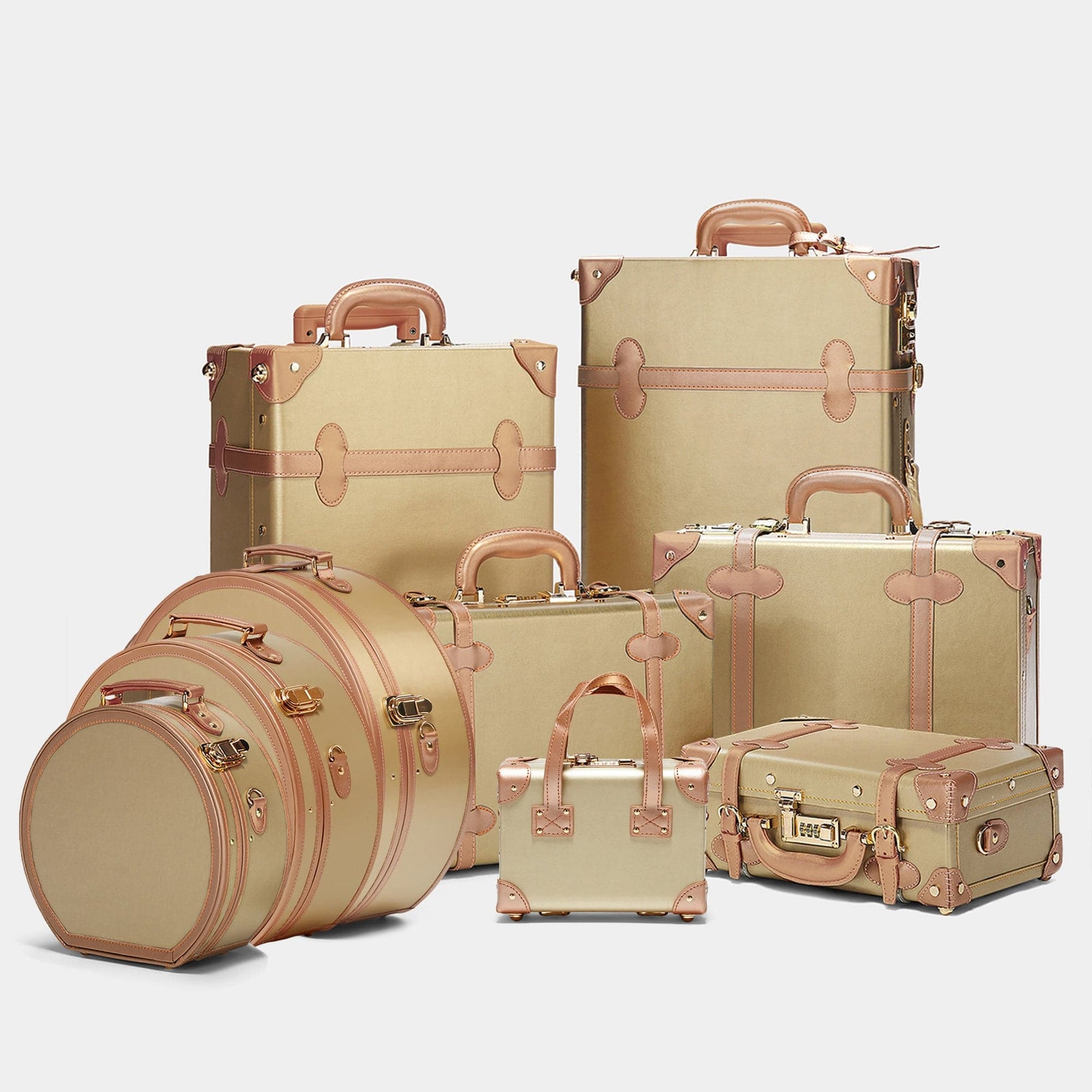 Vintage luggage set of The Alchemist vegan leather suitcase in metallic gold