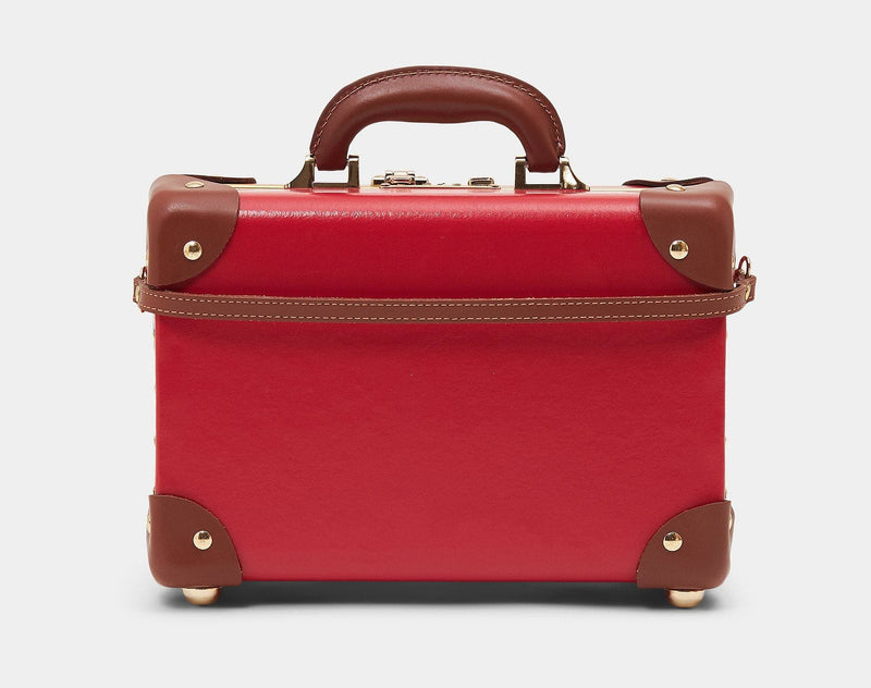 Product view of the vanity Diplomat leather suitcase in red with suitcase attachment strap