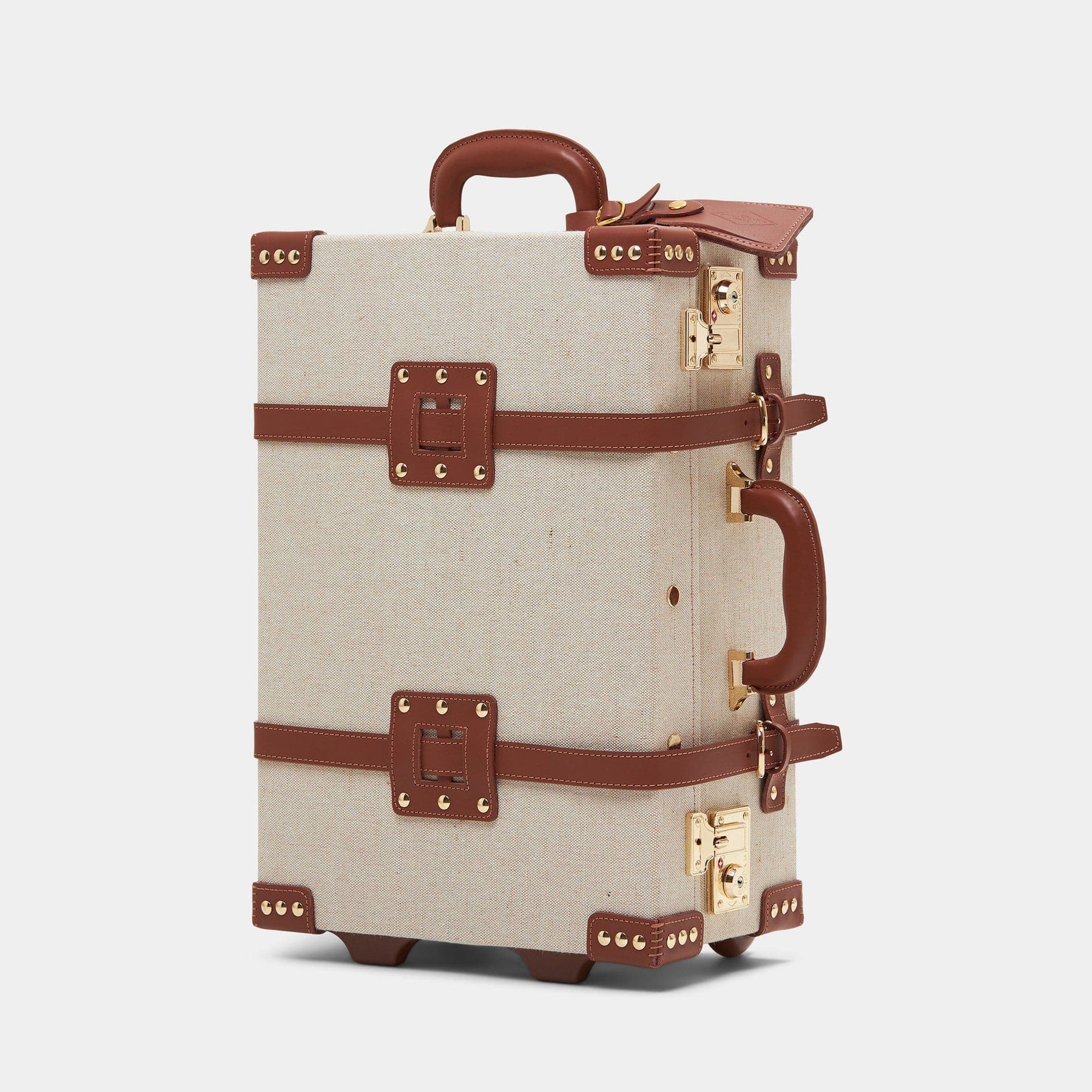 Angled product view of the carry-on Editor linen suitcase with brown trims