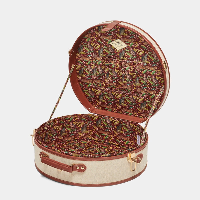 Open product view of the deluxe hatbox Editor linen suitcase with brown trims and exotic-bird print lining