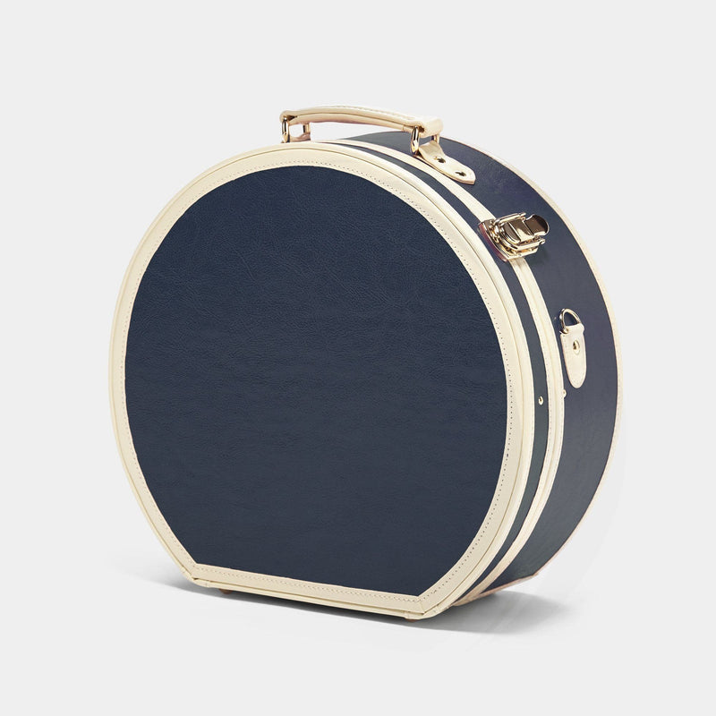 Angled product view of the large hatbox Entrepreneur vegan leather suitcase in navy