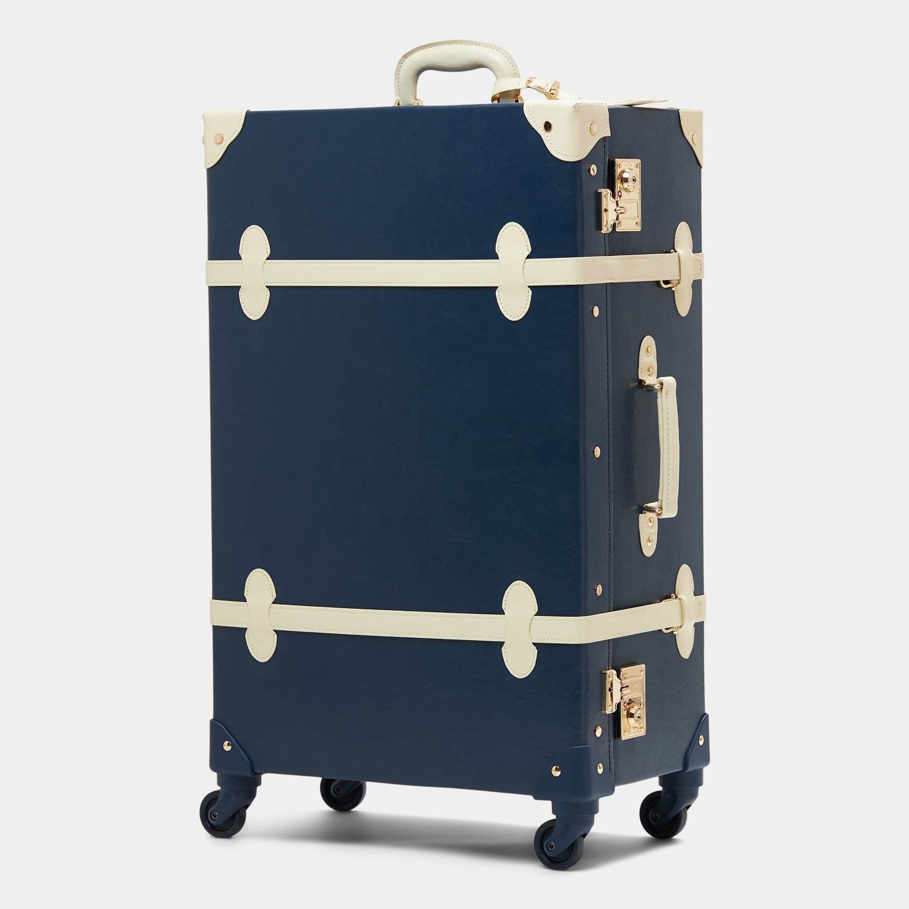 Angled product view of the check-in spinner Entrepreneur vegan leather suitcase in navy