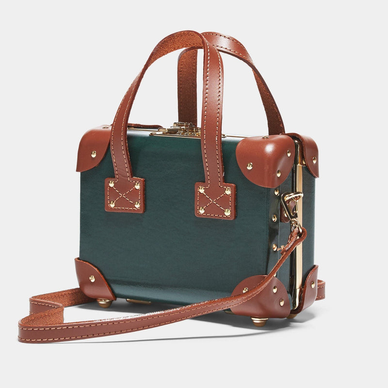 Angled product view of the mini Diplomat leather suitcase in hunter green with shoulder attachment strap