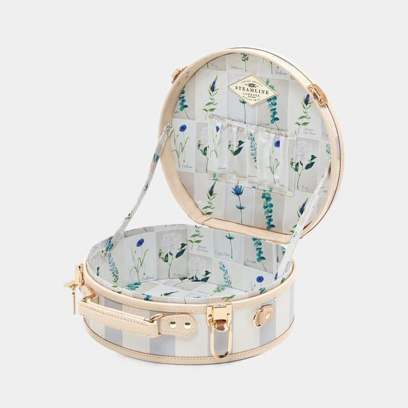 Open product view of the small hatbox Illustrator fibreboard suitcase in blue-stripe with wildflower print lining