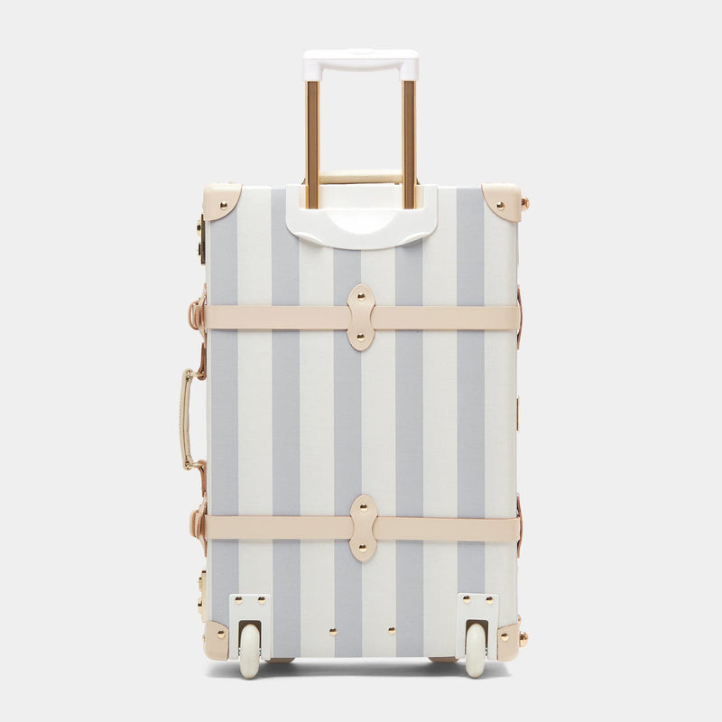 Back product view of the stowaway Illustrator fibreboard suitcase in blue stripe with raised handle