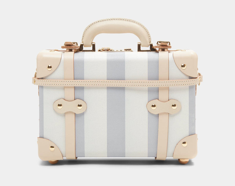 Back product view of the vanity Illustrator fibreboard suitcase in blue-stripe with detachable suitcase strap