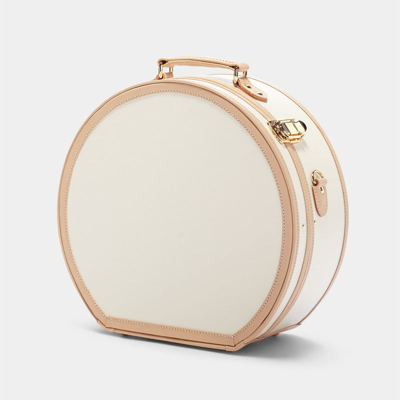 Angled product view of the deluxe hatbox Sweetheart fibreboard suitcase in cream