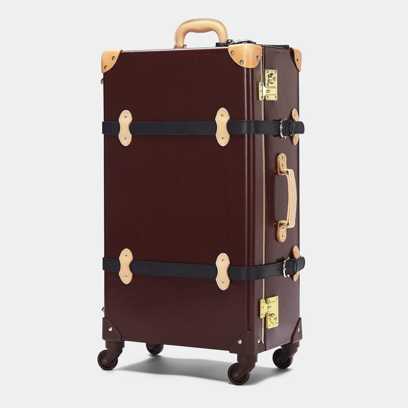 Angled product view of the check-in Architect leather suitcase in burgundy