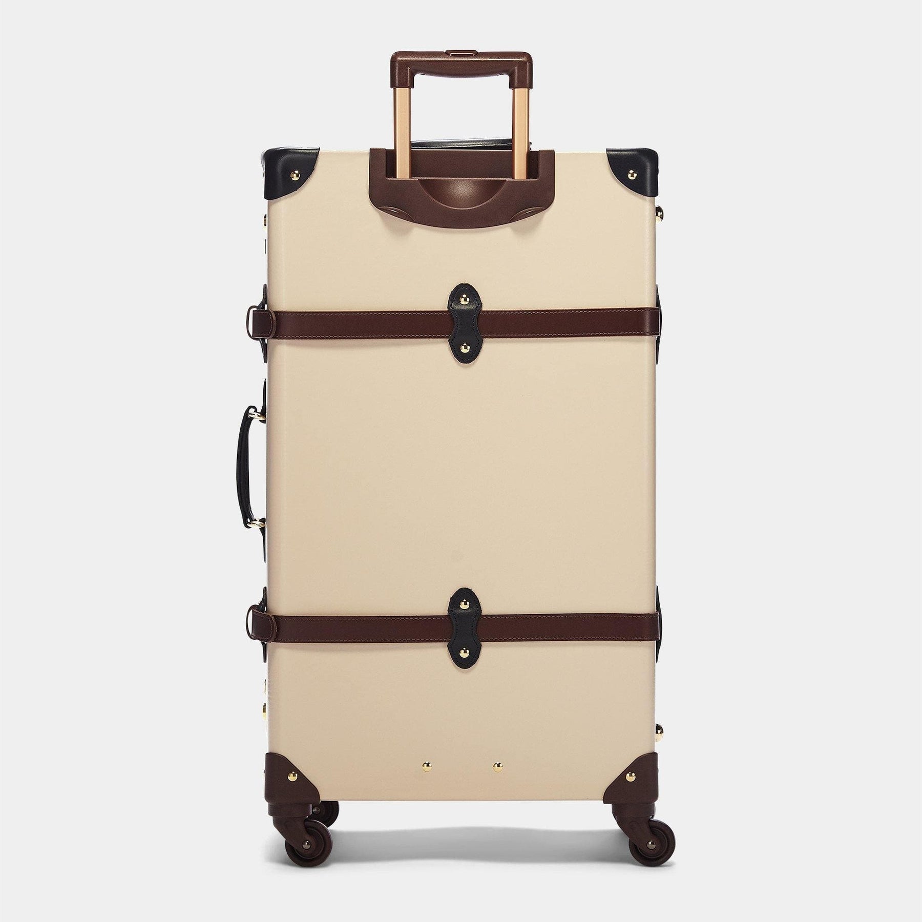 Back product view of the check-in Architect leather suitcase in cream with raised handle