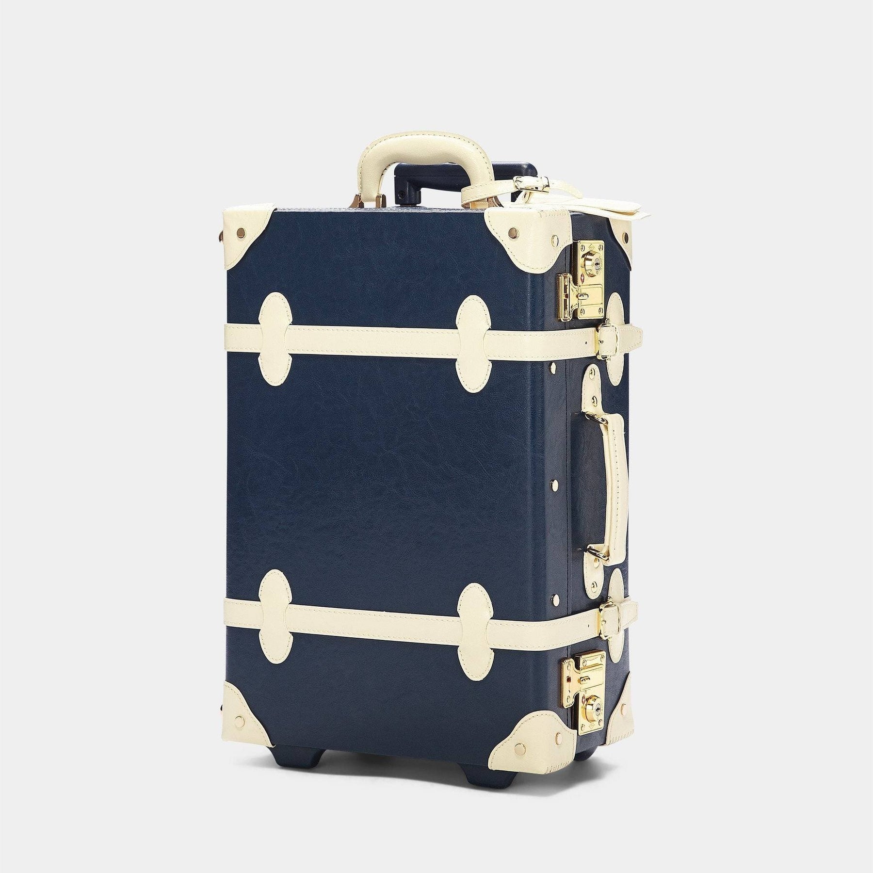 Angled product view of the carry-on Entrepreneur vegan leather suitcase in navy