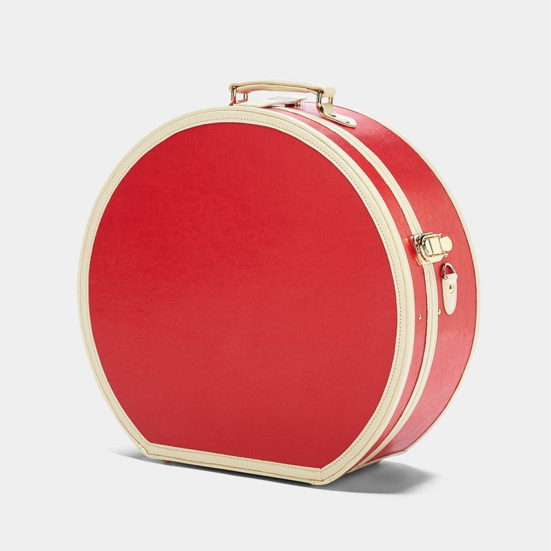 Angled product view of the deluxe hatbox Entrepreneur vegan leather suitcase in lipstick red 