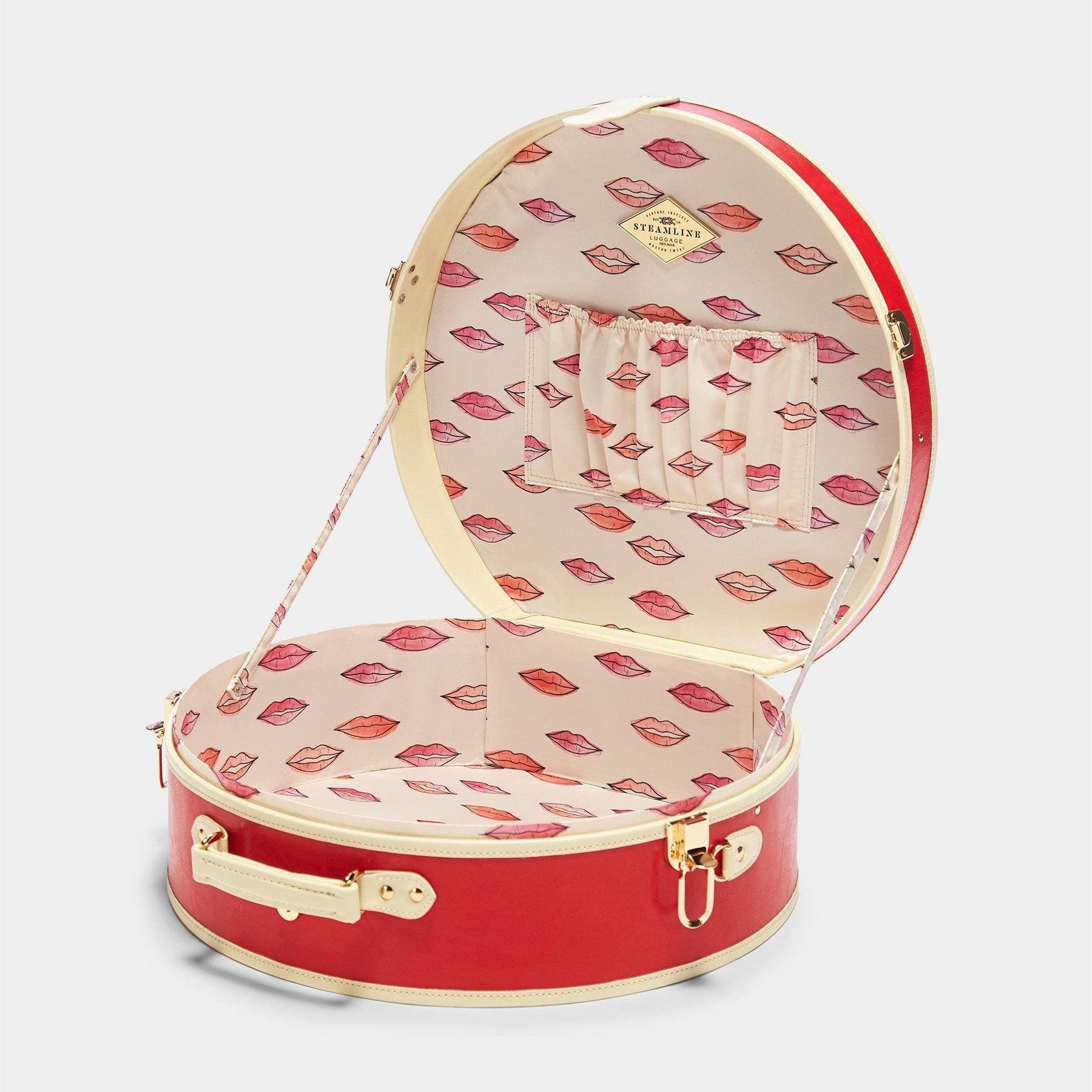 Open product view of the deluxe hatbox Entrepreneur vegan leather suitcase in lipstick red with lip print lining