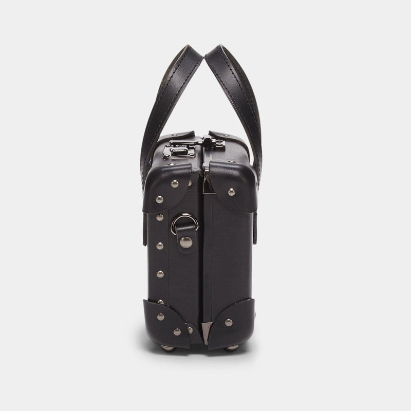 Side product view of the mini Industrialist fibreboard suitcase in  black