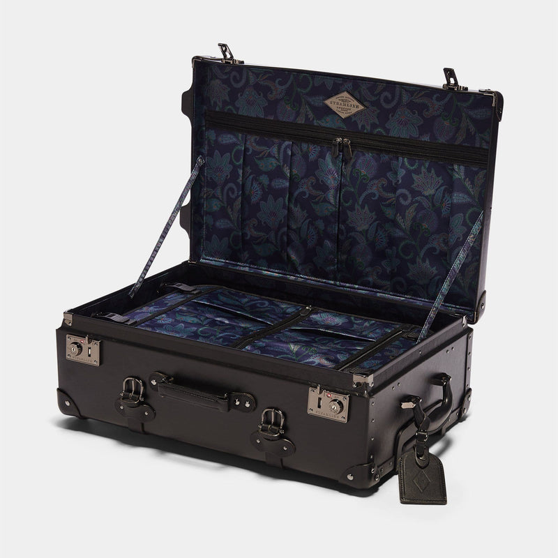 Open product view of the stowaway Industrialist fibreboard suitcase in black with paisley printed lining