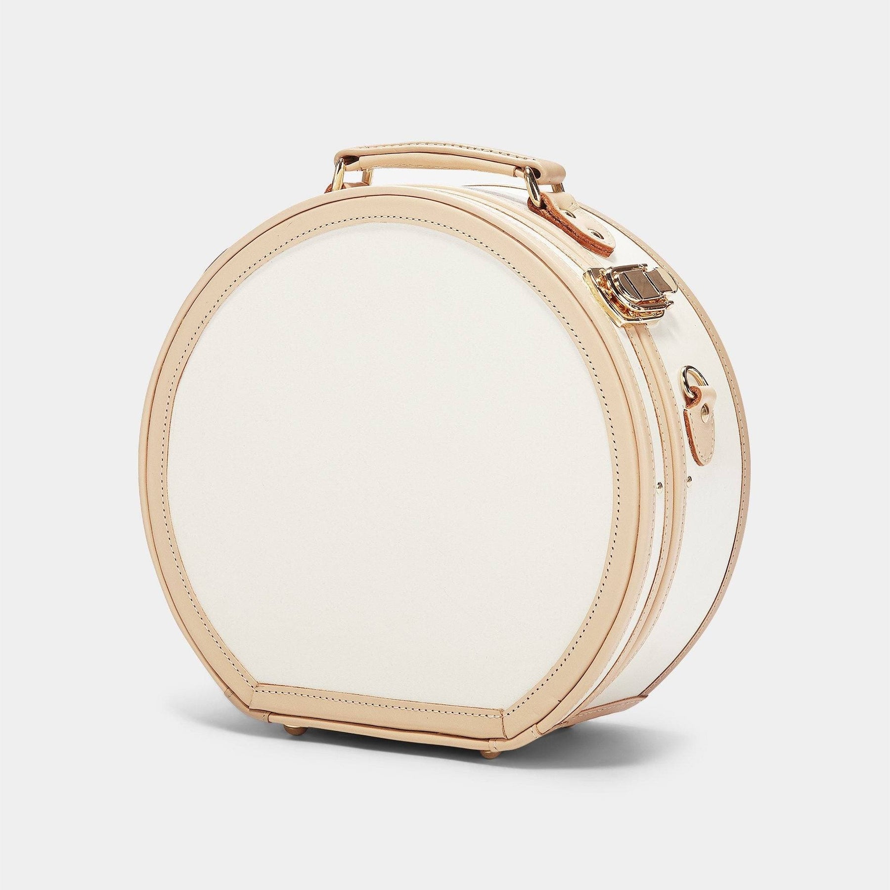 Angled product view of the small hatbox Sweetheart fibreboard suitcase in cream