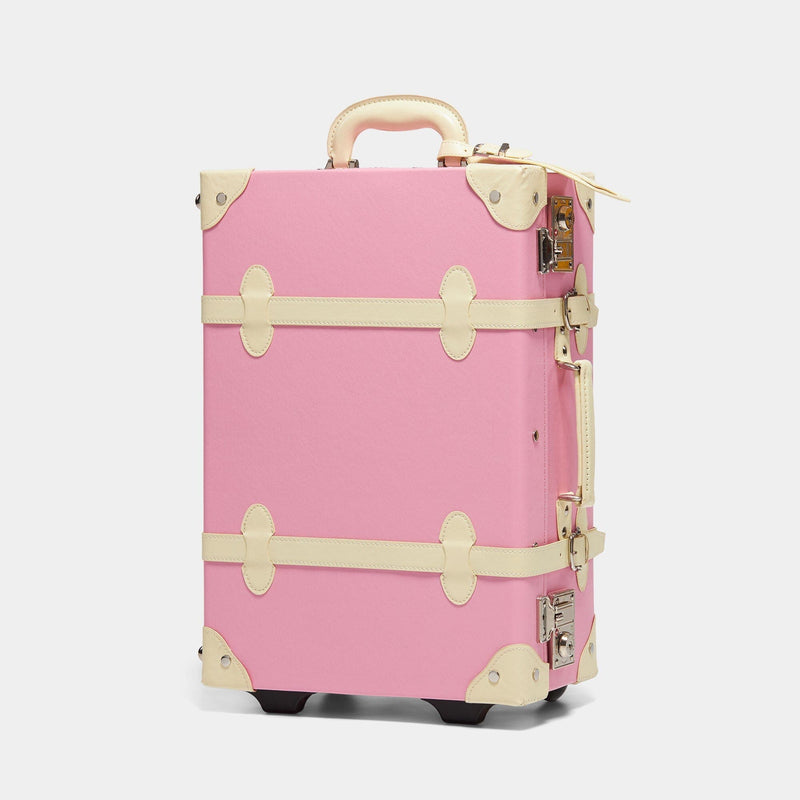 Angled product view of the carry-on Entrepreneur vegan leather suitcase in pink