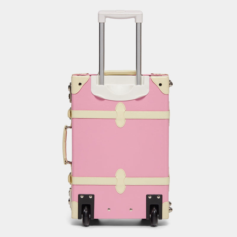 Back product view of the carry-on Entrepreneur vegan leather suitcase in pink with raised handle