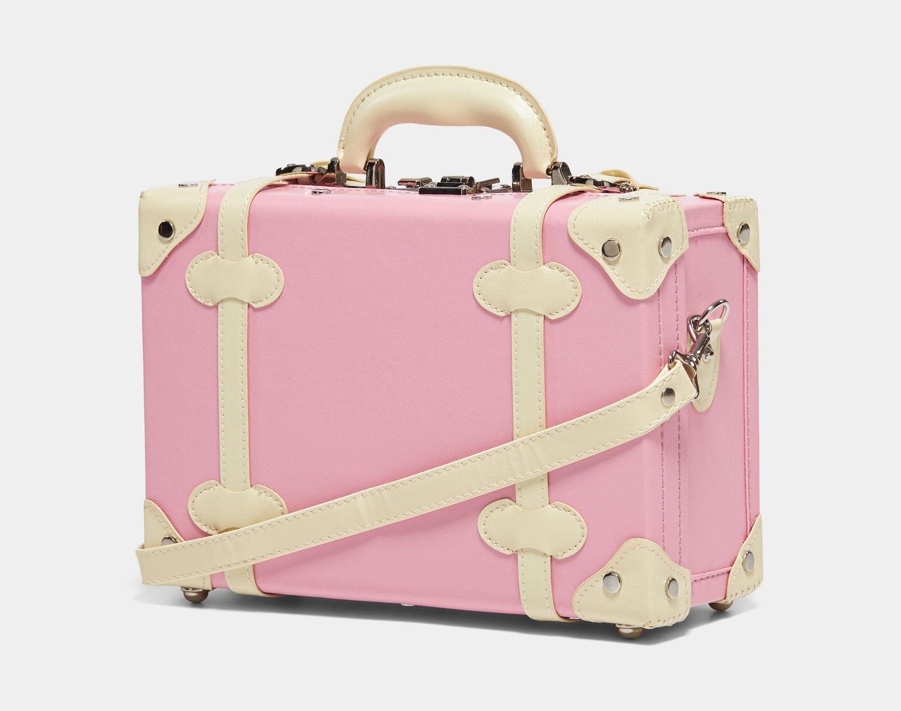 Angled product view of the vanity Entrepreneur vegan leather suitcase in  pink with shoulder attachment strap